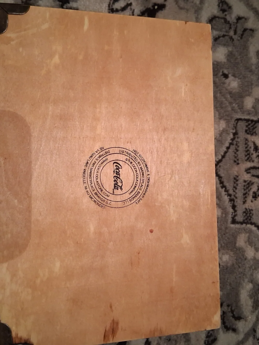Coca-Cola Crate with Bold Red Logo on Wood